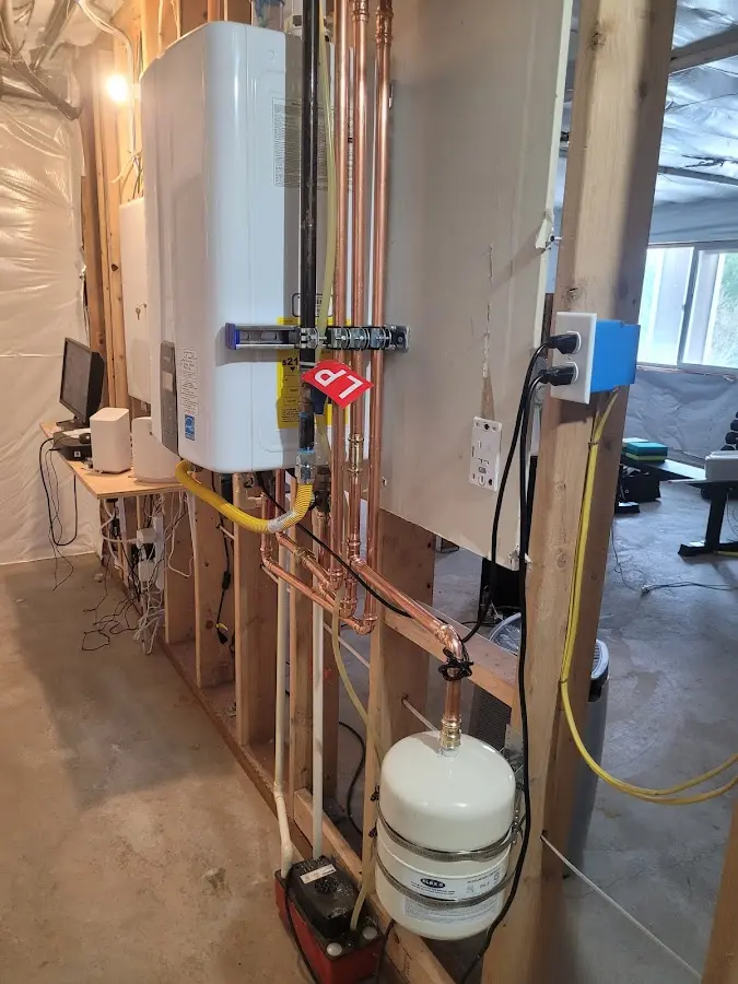 Licensed plumber repairing a kitchen sink in Hackettstown