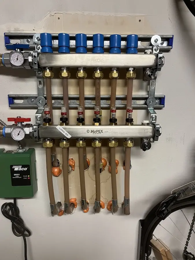 Plumber performing Water Heater Repair at a residential property in Hackettstown